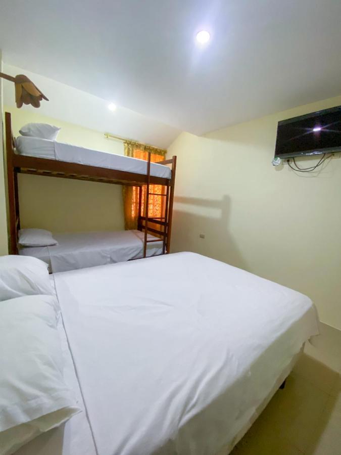 Hostal Tortuga Dorada Puerto Lopez Bagian luar foto